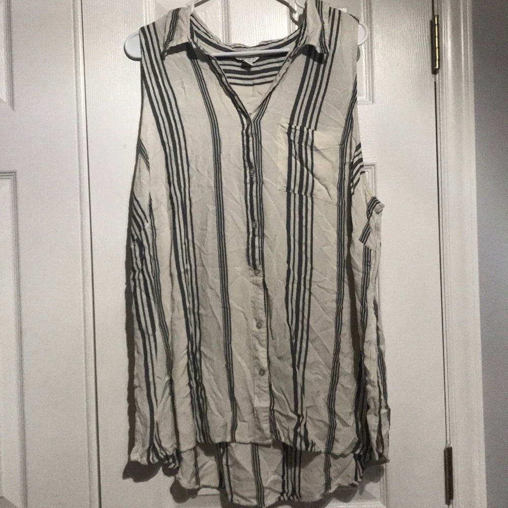 Dark blue/ black vertical strips. Cream button up.